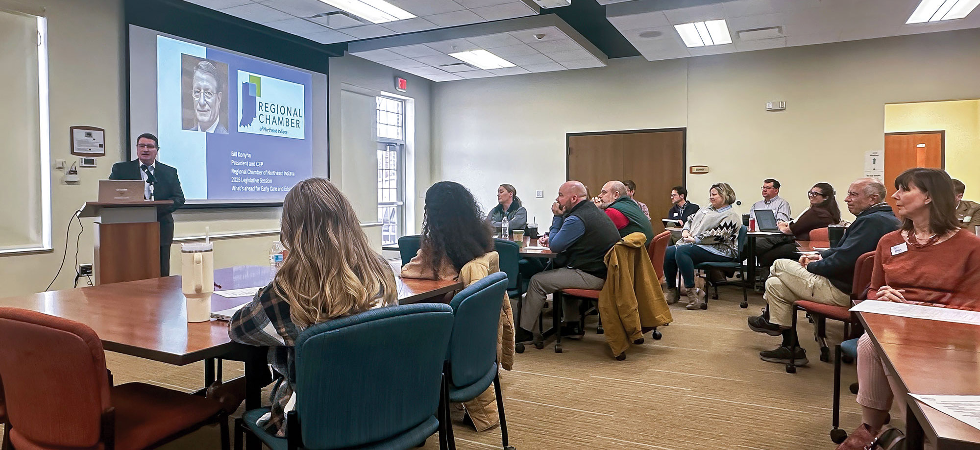 business, education, and childcare professionals listening to a speaker at a northeast Indiana early childhood coalition meeting