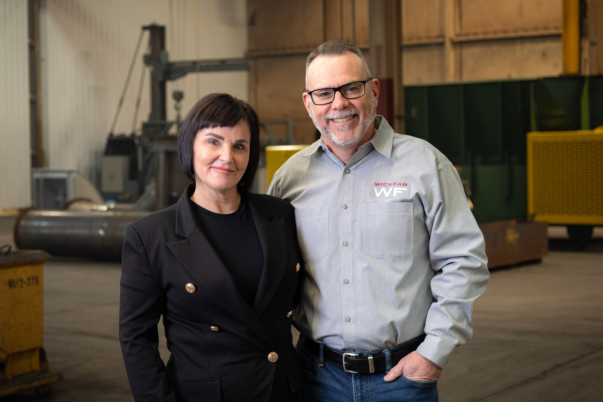 Wickfab owners Joe and Cheryl Cochran standing in warehouse